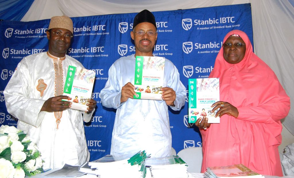 L-R: Zonal Head, North West, Mr. Bala Shehu; Head, Public Sector Group, Mr. Yusufu Modibbo, both of Stanbic IBTC Bank, and Principal, Government Girls Secondary School, Maimuna Gwarzo, Tudun Wada, Kaduna State, Hajiya Hassana Usman, during an event organised by Stanbic IBTC to mark the 2016 Financial Literacy Day at GGSS Kaduna on Thursday, 17 March, 2016.